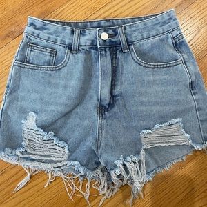 New in bag!  Woman’s jean shorts.  Size XS. High waisted ripped raw hem.